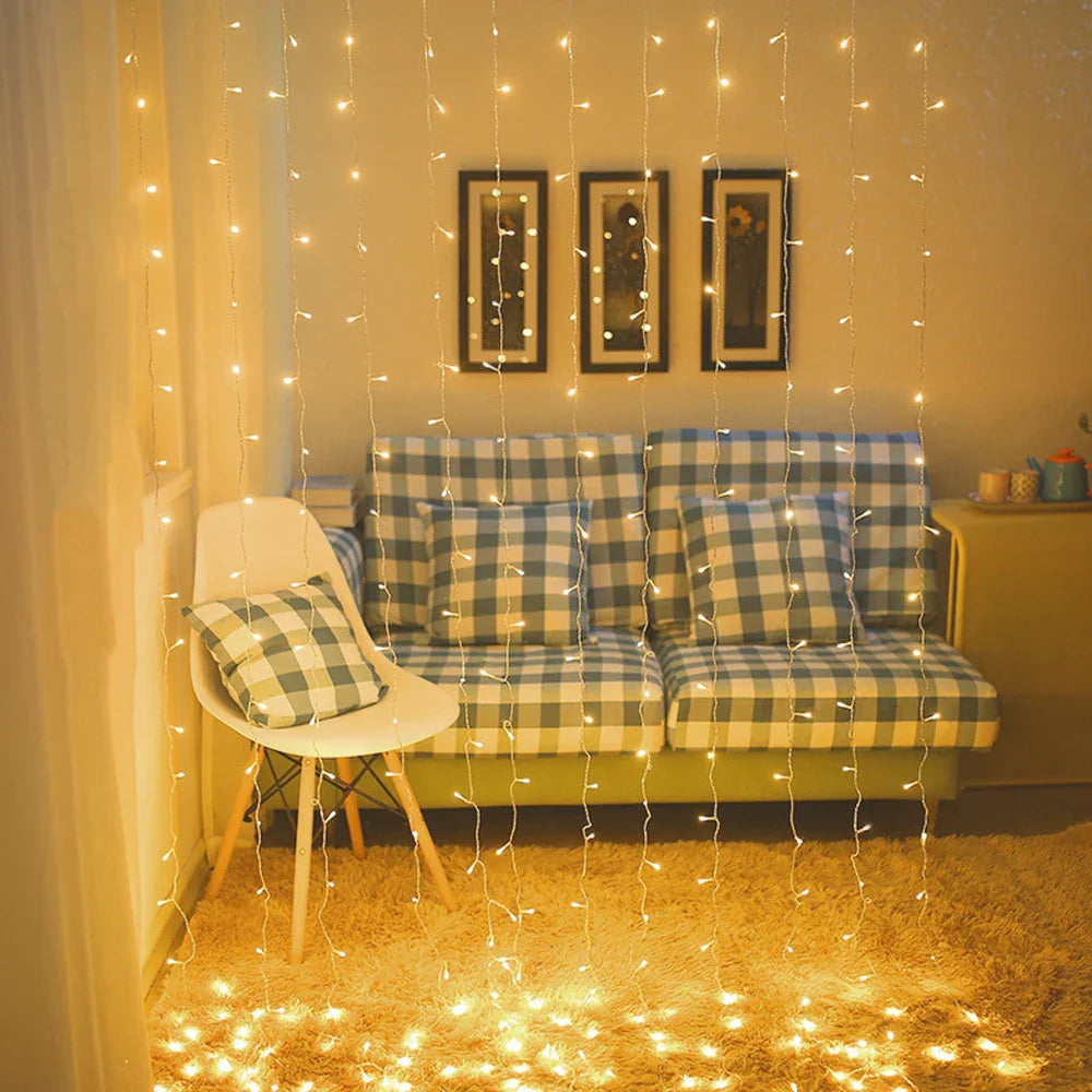 Living room with checkered sofa, chair, and string lights