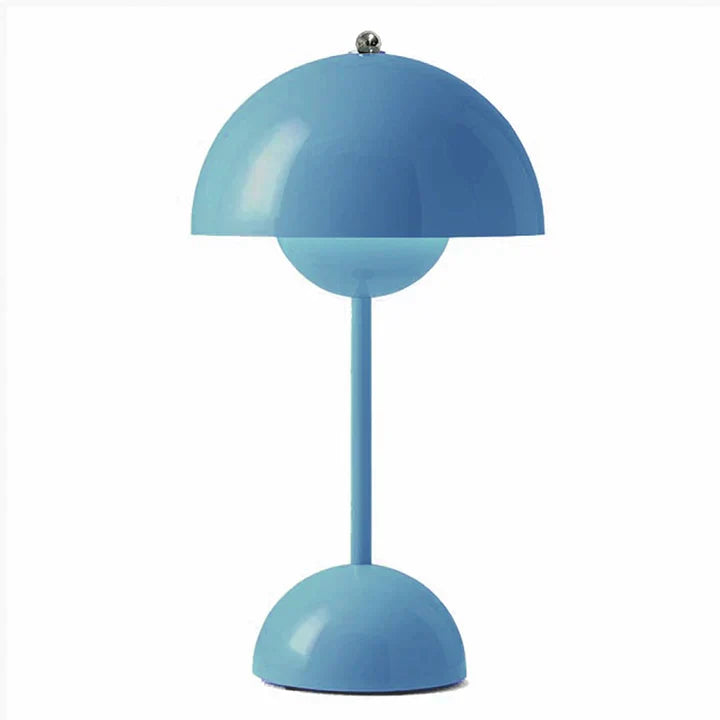 Blue table lamp with a unique design on a white background