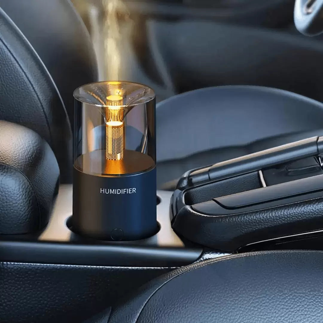 Car humidifier on a car's cup holder with steam rising