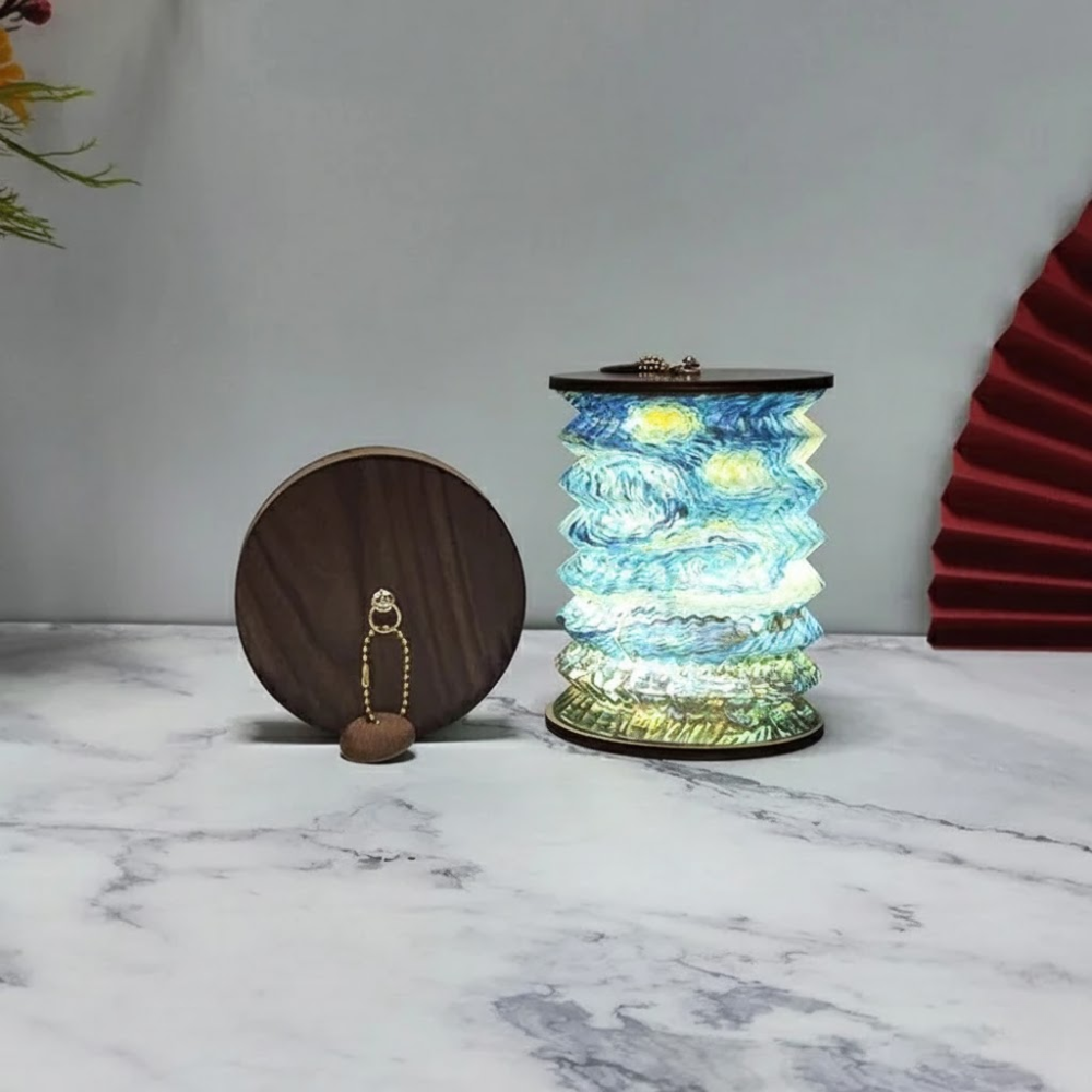 Decorative lamp with colorful spiral design on a marble surface