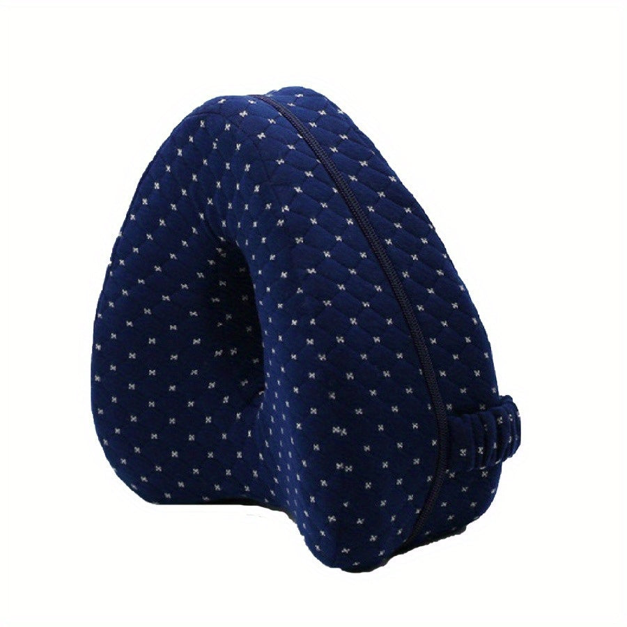 Navy blue pillow with white patterns on a white background