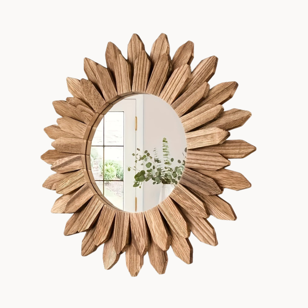 Wooden sunburst mirror on a white background