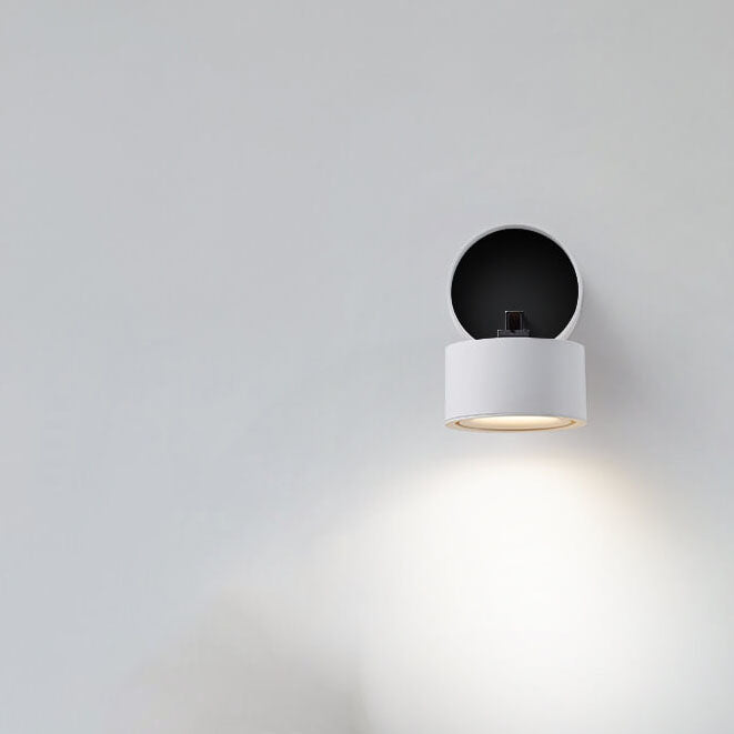 Modern wall-mounted light fixture on a gray background