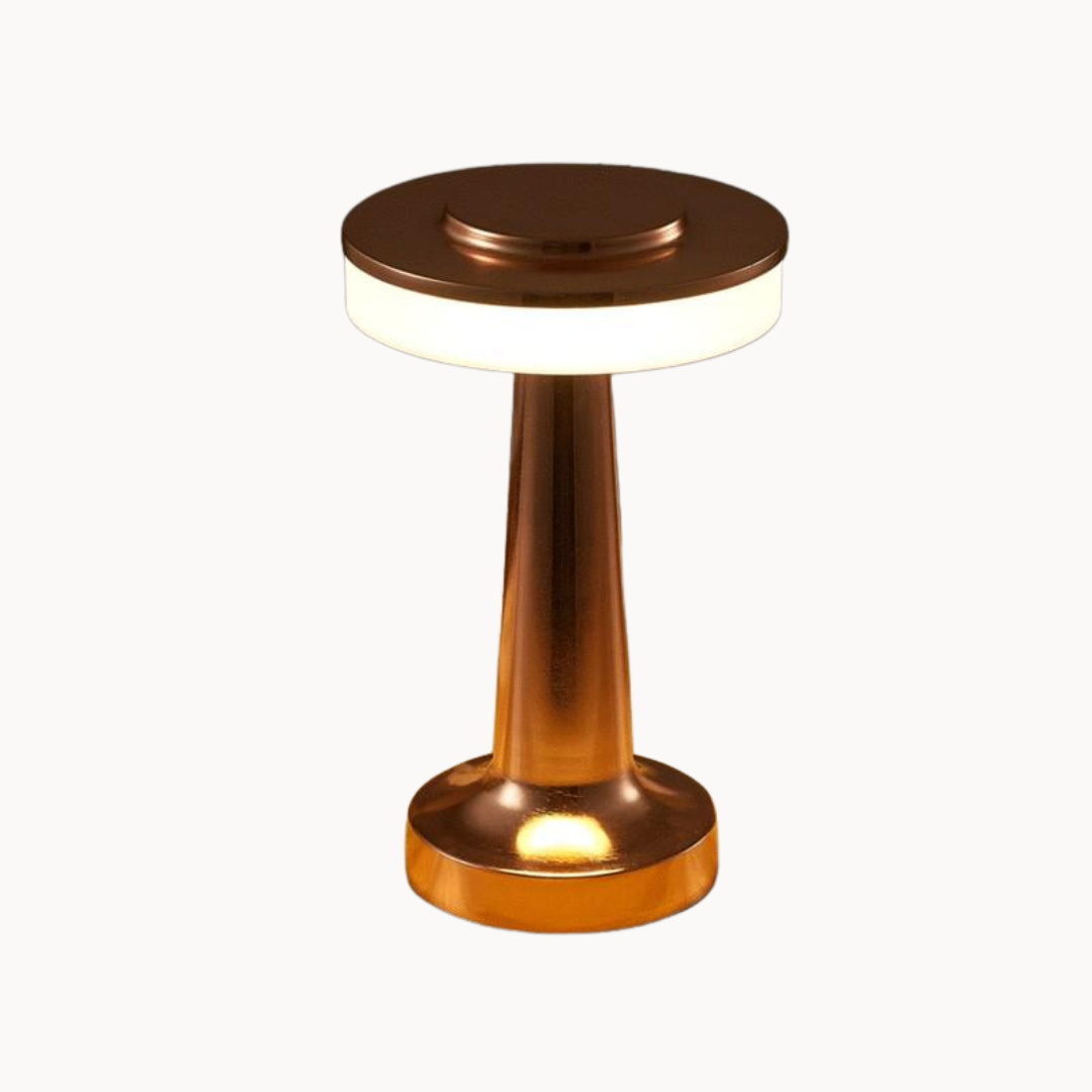 Bronze-colored cylindrical lamp on a white background