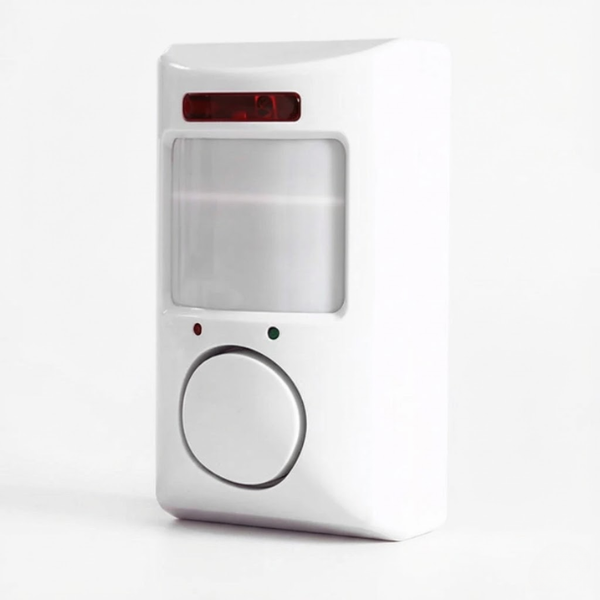 White motion sensor with red light on a white background