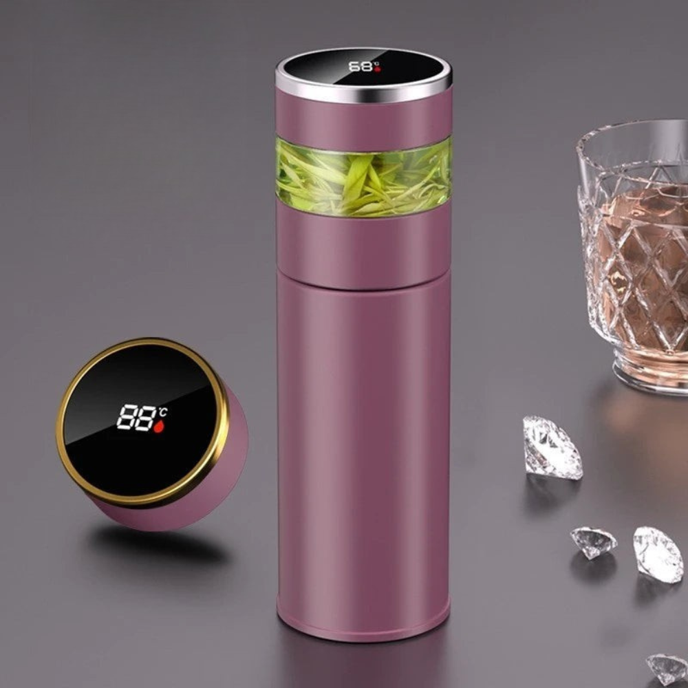 Purple thermos with digital temperature display, glass of water, and diamonds on a dark background