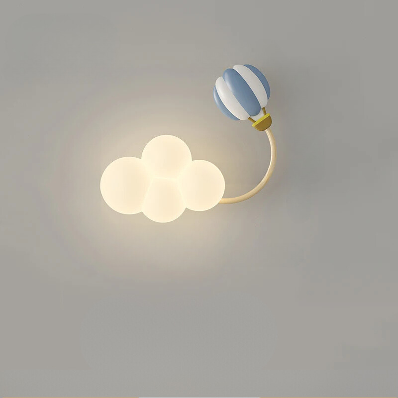 Decorative wall light with cloud and balloon design on a gray background