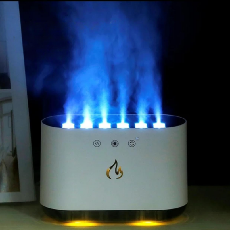 White electronic device with blue flames on a dark background