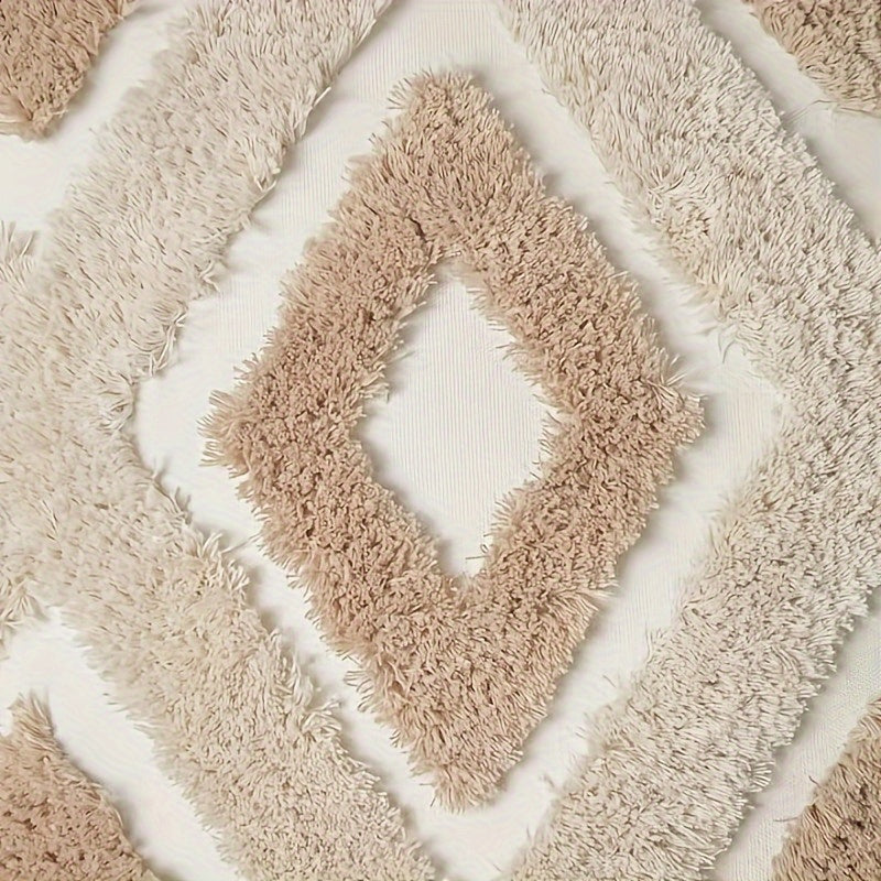Close-up of a beige shaggy rug with diamond pattern