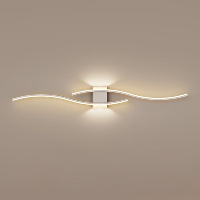 Modern wall light fixture on a beige wall