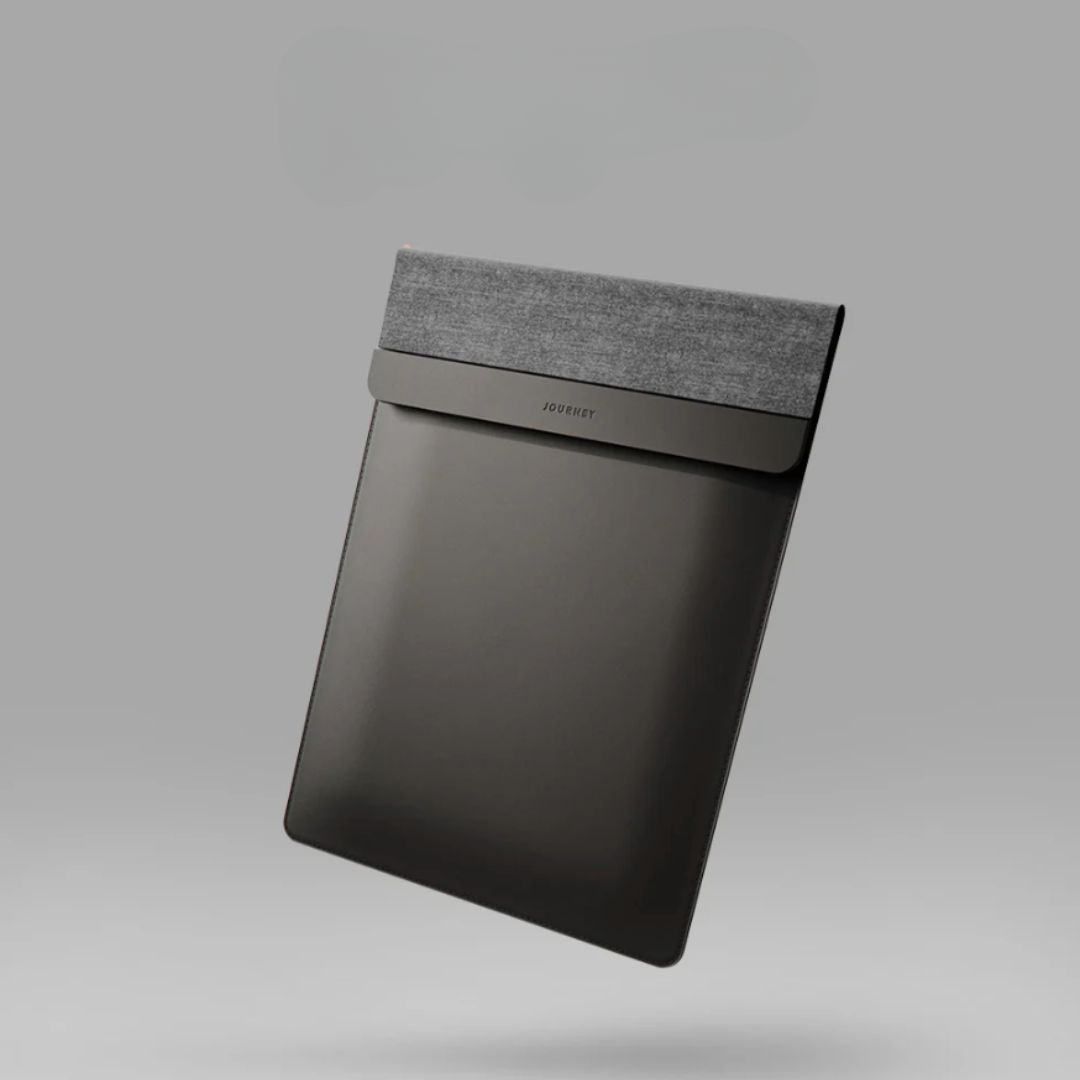 Black and gray laptop sleeve on a light gray background