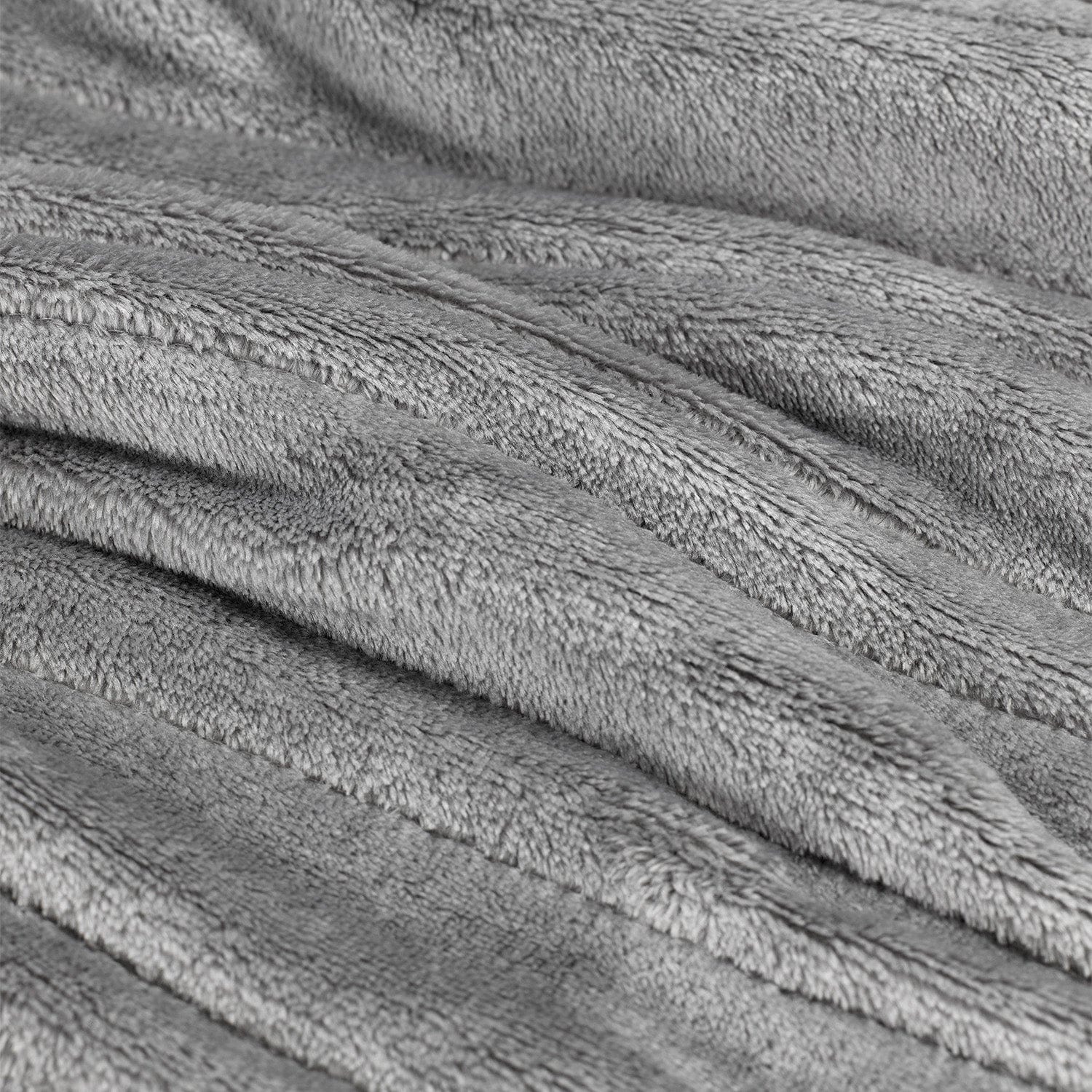 Stack of gray towels with a textured surface