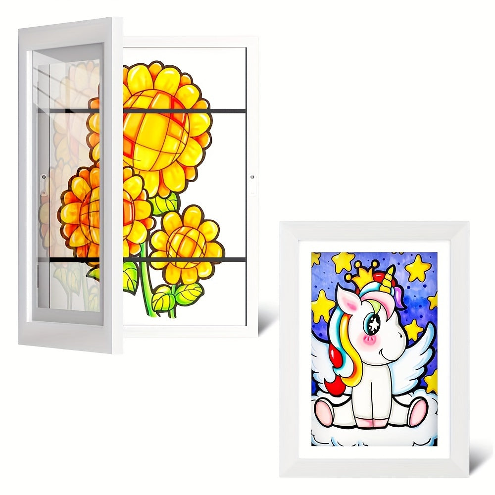 Two framed artworks: a colorful unicorn illustration and a floral design.