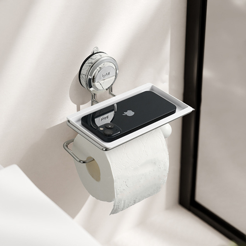 Phone holder with a smartphone attached, mounted on a white wall.
