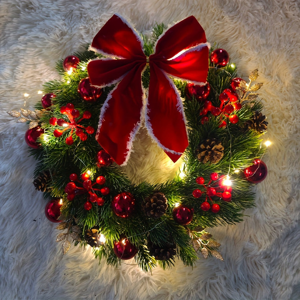 Decorative Christmas wreath with red berries, pine cones, and a large red bow on a textured white background.