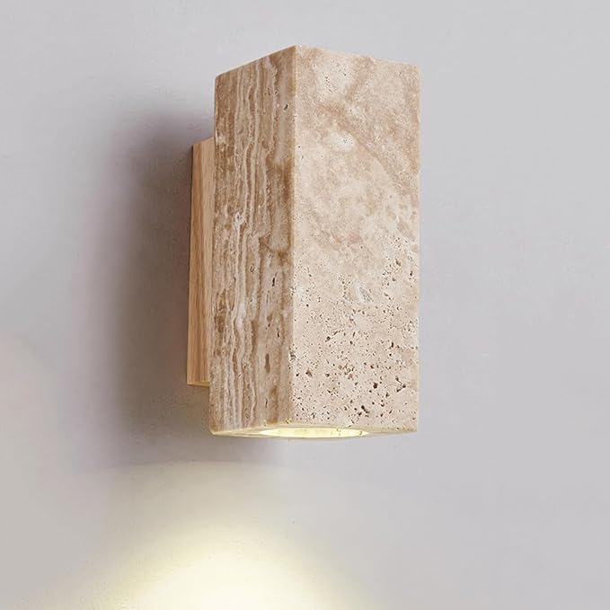 Beige stone wall sconce on a gray background