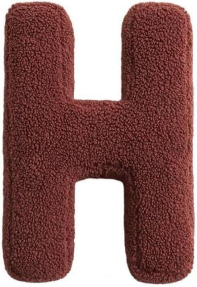 Brown textured letter 'H' on a white background