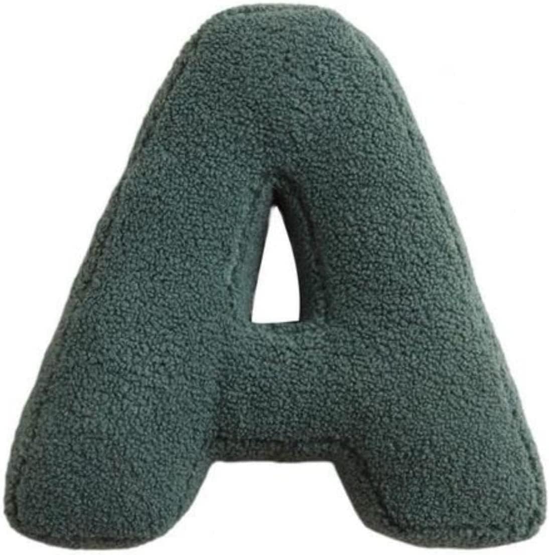 Green letter 'A' pillow on a white background