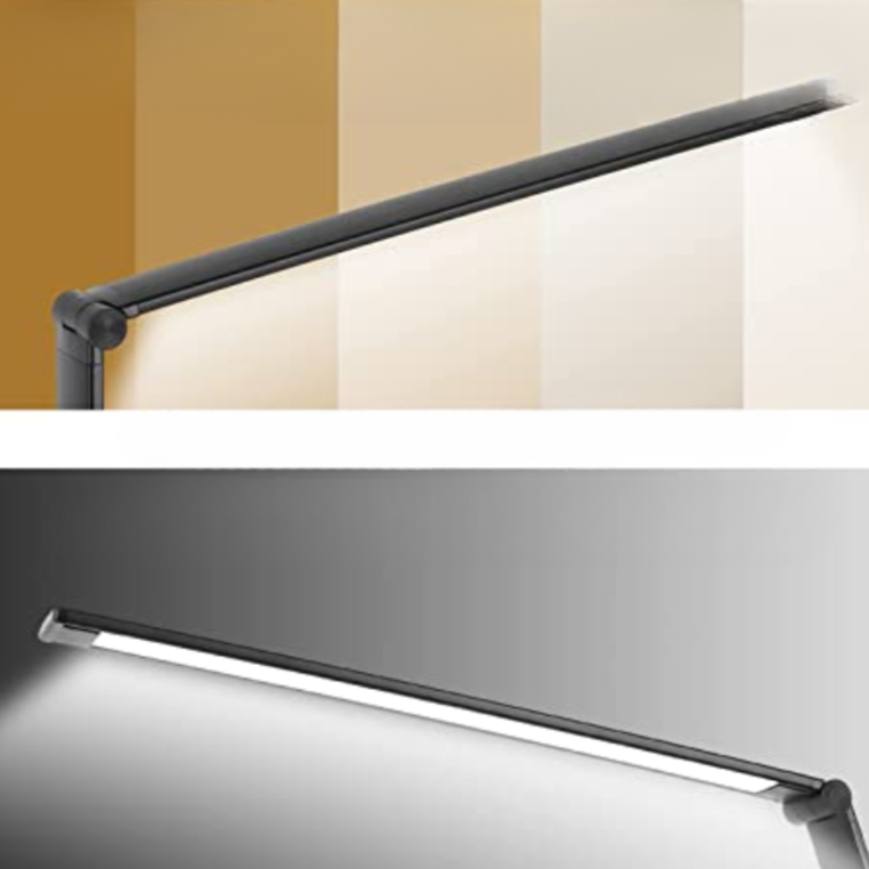 Modern wall-mounted light fixture on a striped background