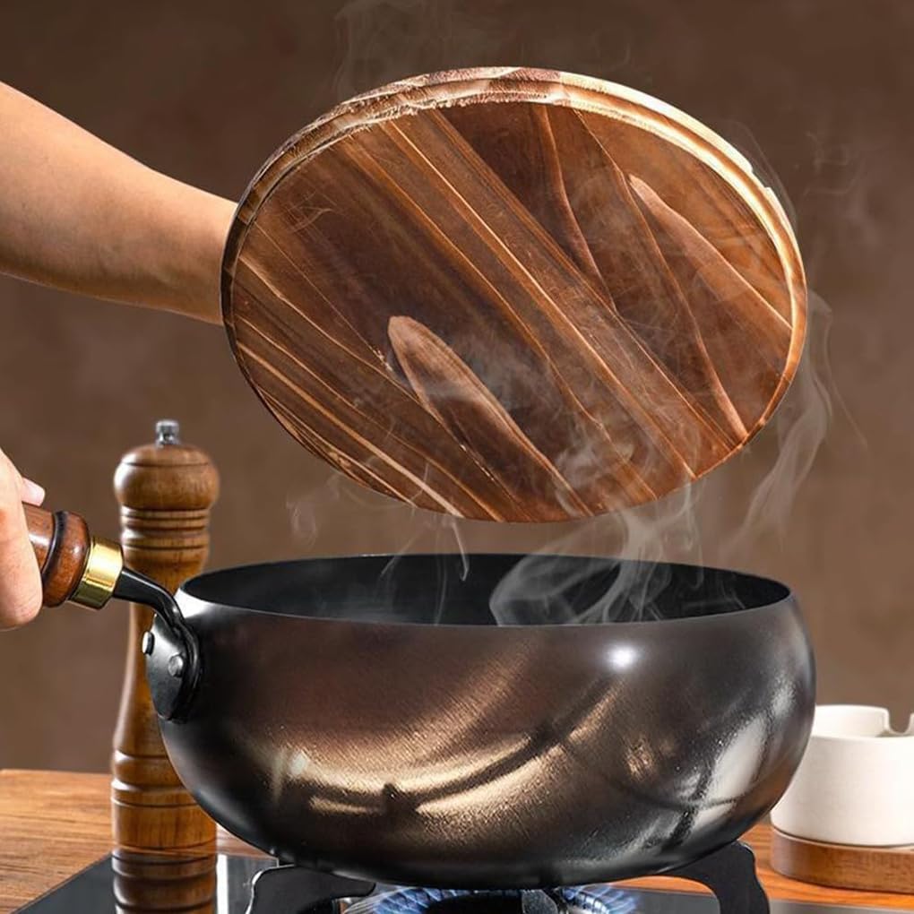 Person opening a wooden lid on a steaming wok with a blurred background
