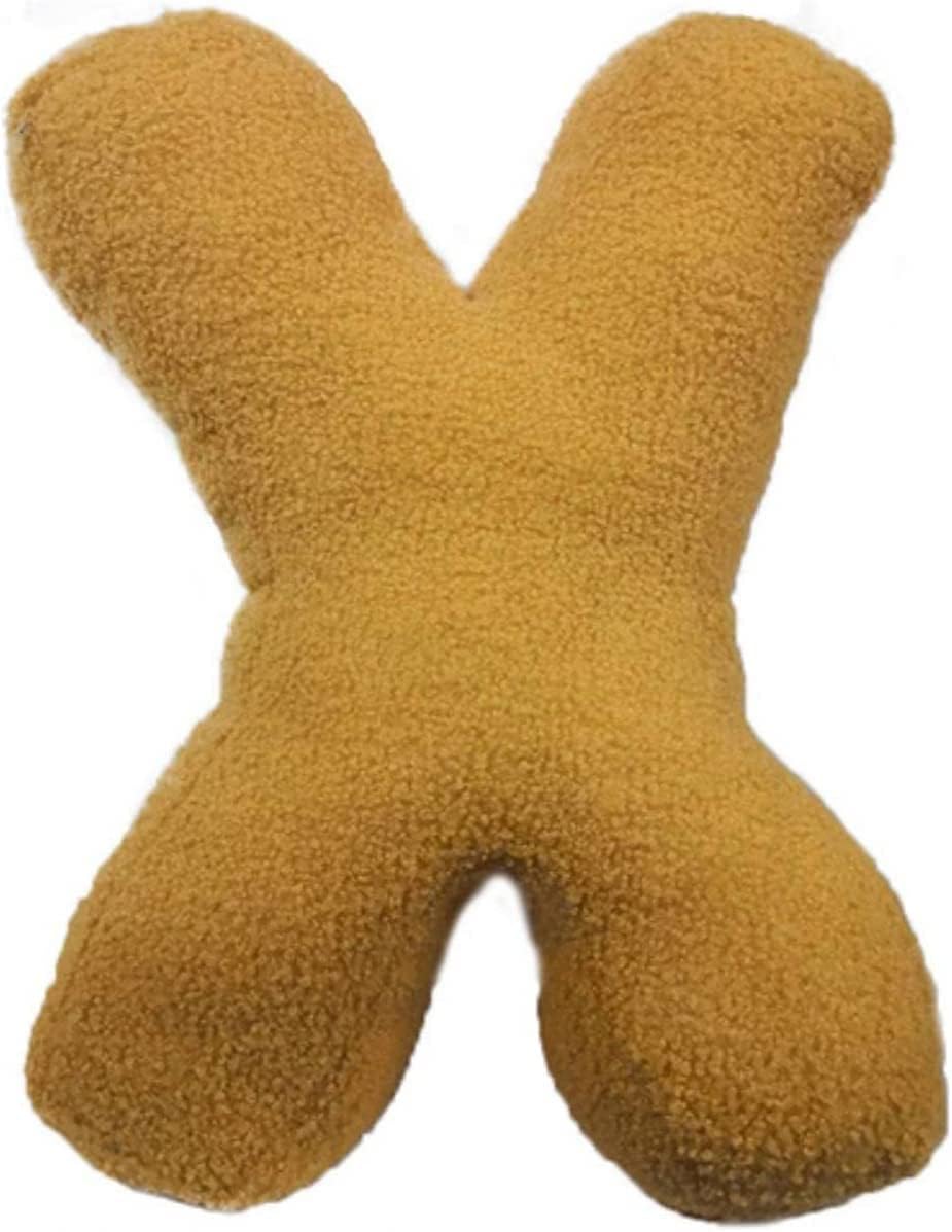 Yellow plush letter 'X' toy on a white background