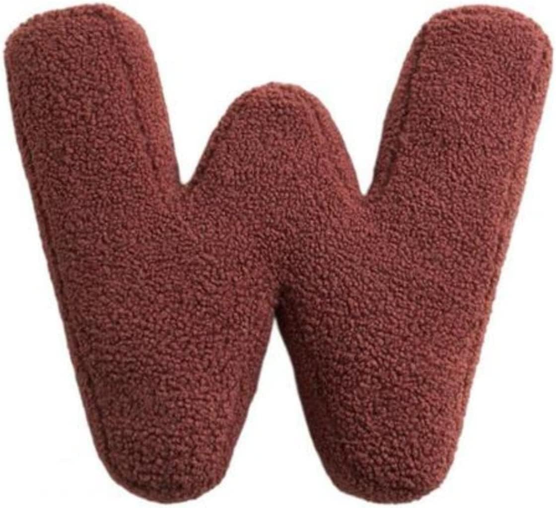 Brown letter 'W' made of textured material on a white background