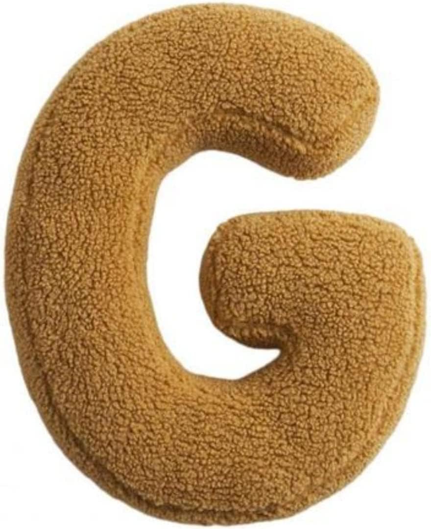 Brown U-shaped pillow on a white background