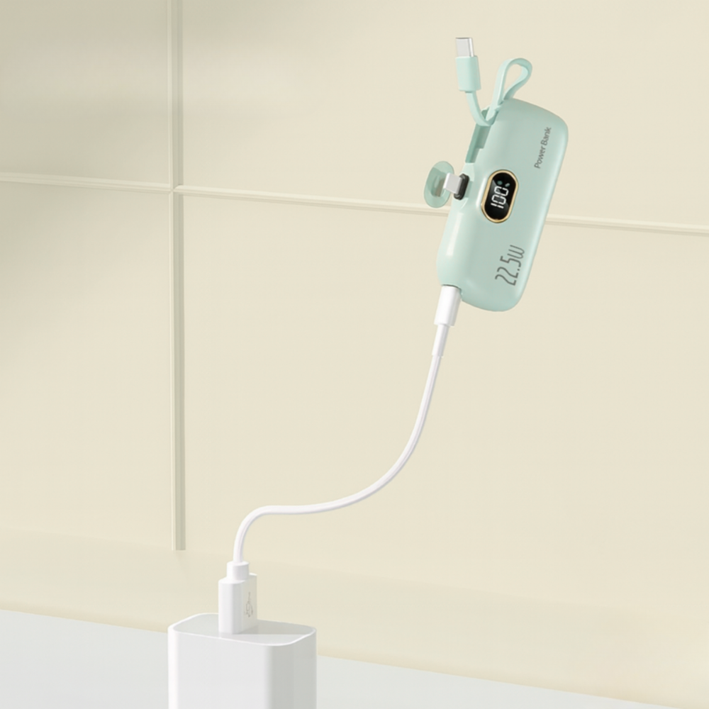 Portable electronic device with digital display on a beige background