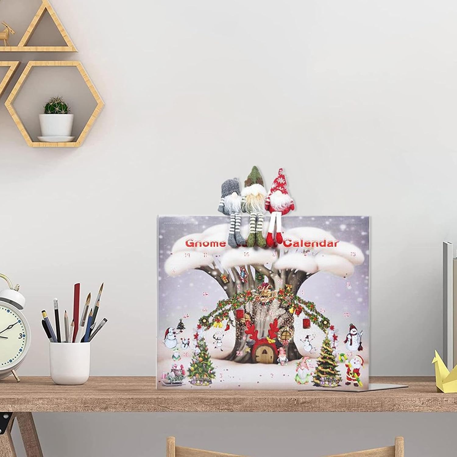 Gnome-themed calendar on a desk with decorative items