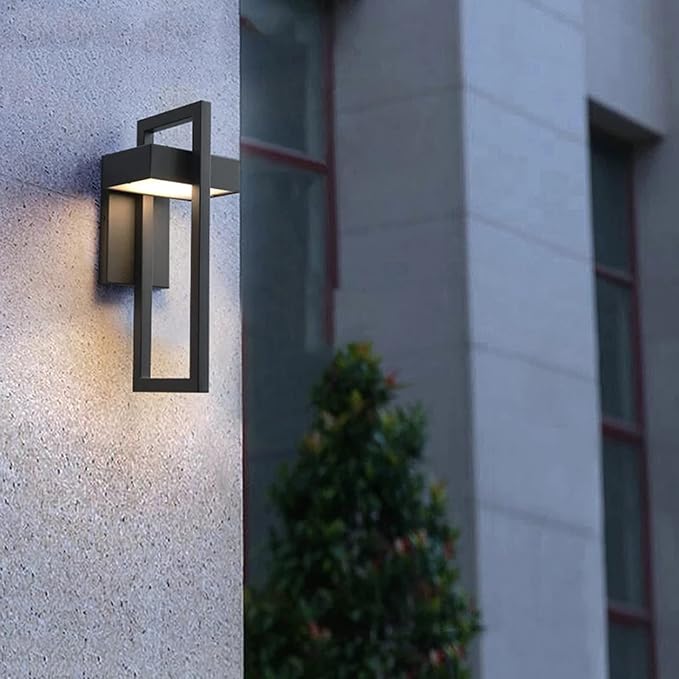Modern outdoor wall light fixture on a building exterior.