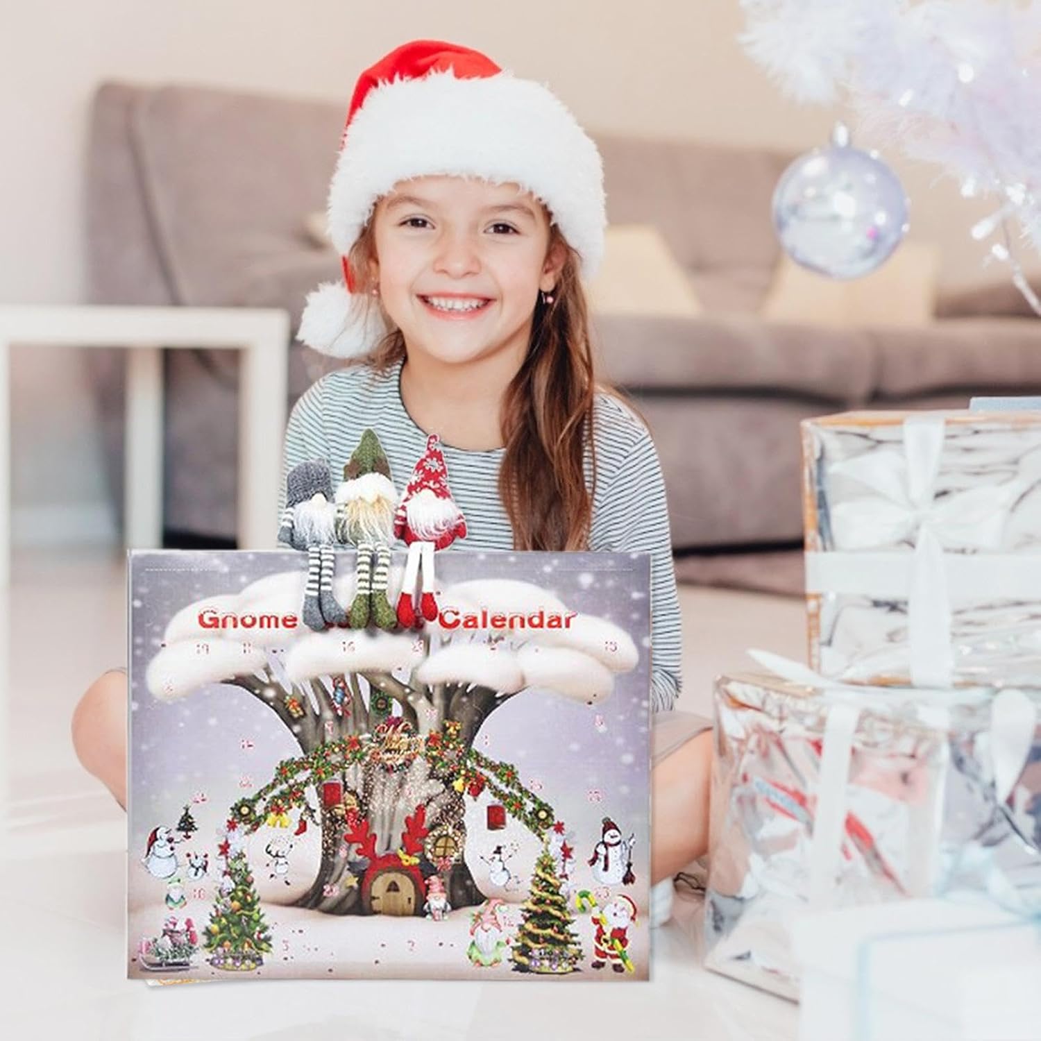 Child wearing a Santa hat holding a gnome calendar in a festive setting.