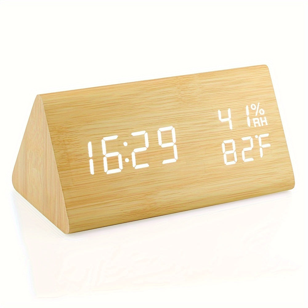 Wooden triangle-shaped digital clock with LED display on a white background