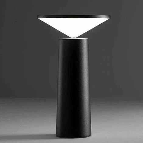 Modern black lamp with white light on a dark background