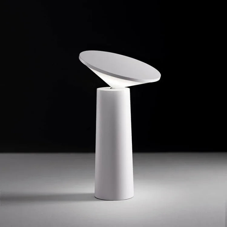 Modern white lamp with a unique design on a dark background
