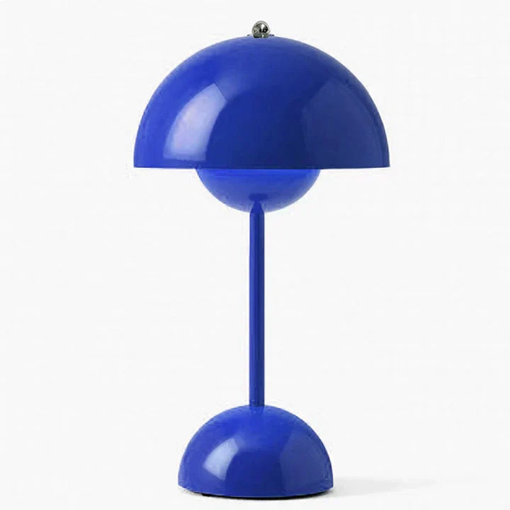 Blue table lamp with a unique design on a white background