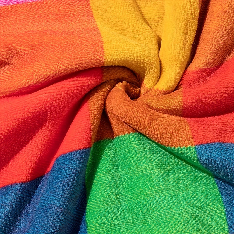 Close-up of colorful fabric with red, yellow, green, and blue stripes.