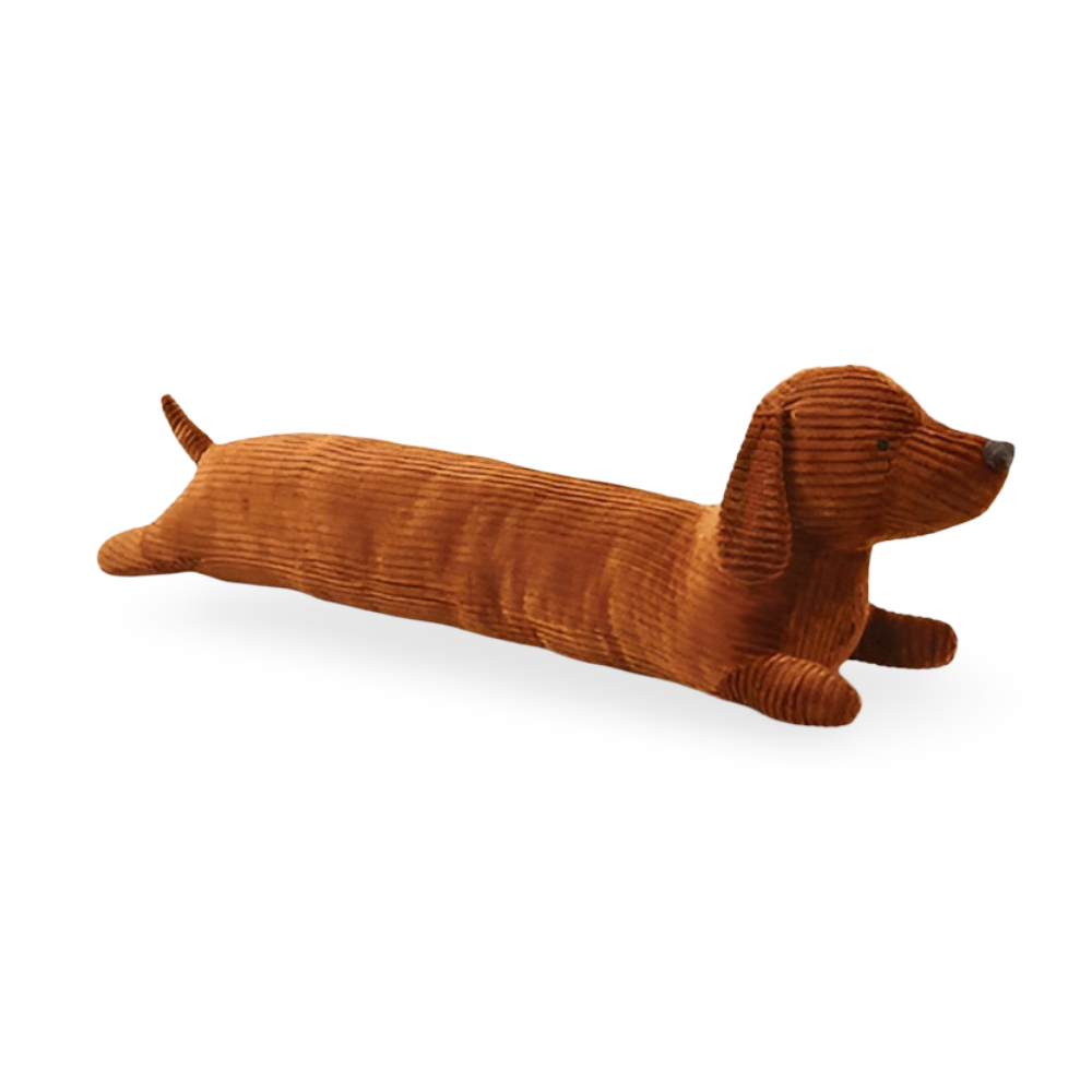 Brown dog-shaped cushion on a white background