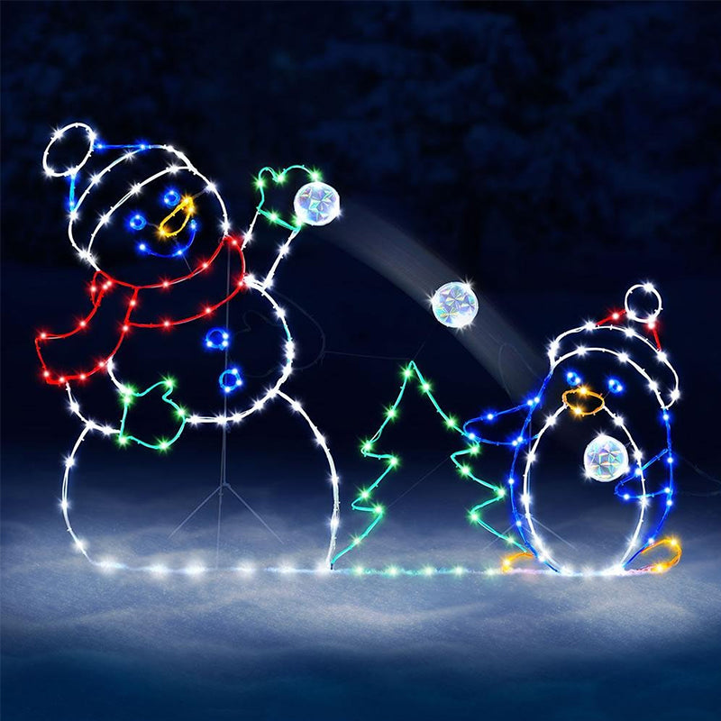 Decorative LED snowman and penguin with a Christmas tree on a dark background