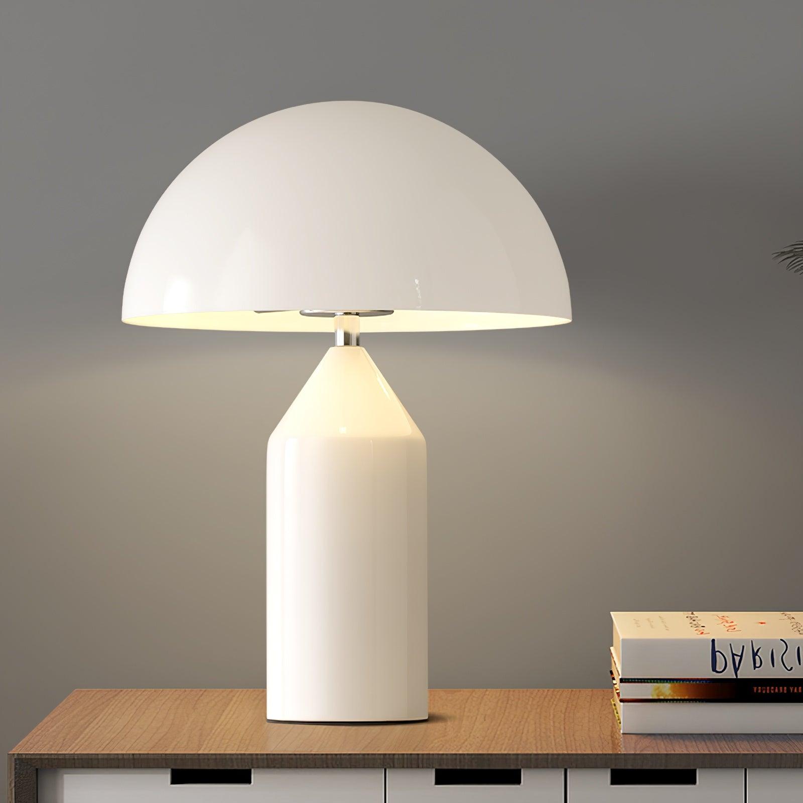 White table lamp on a wooden surface with a gray background