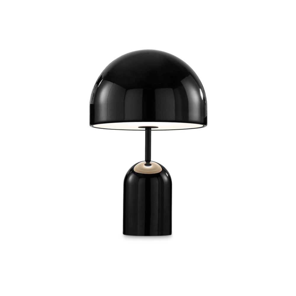 Black table lamp with a white base on a white background