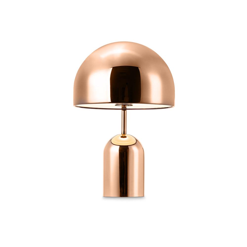 Copper-colored lamp on a white background