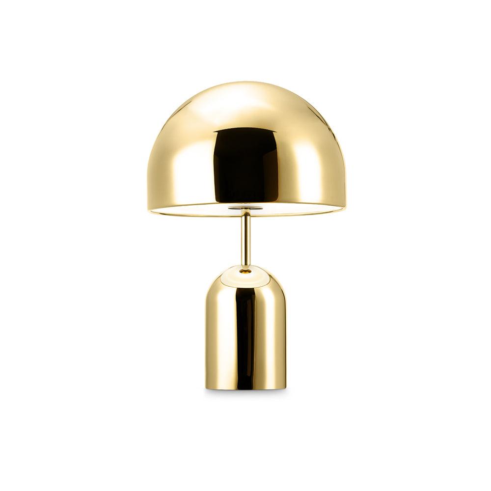 Gold table lamp on a white background