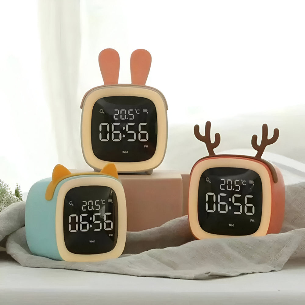 Three cartoon-style digital clocks with animal ears on a light background