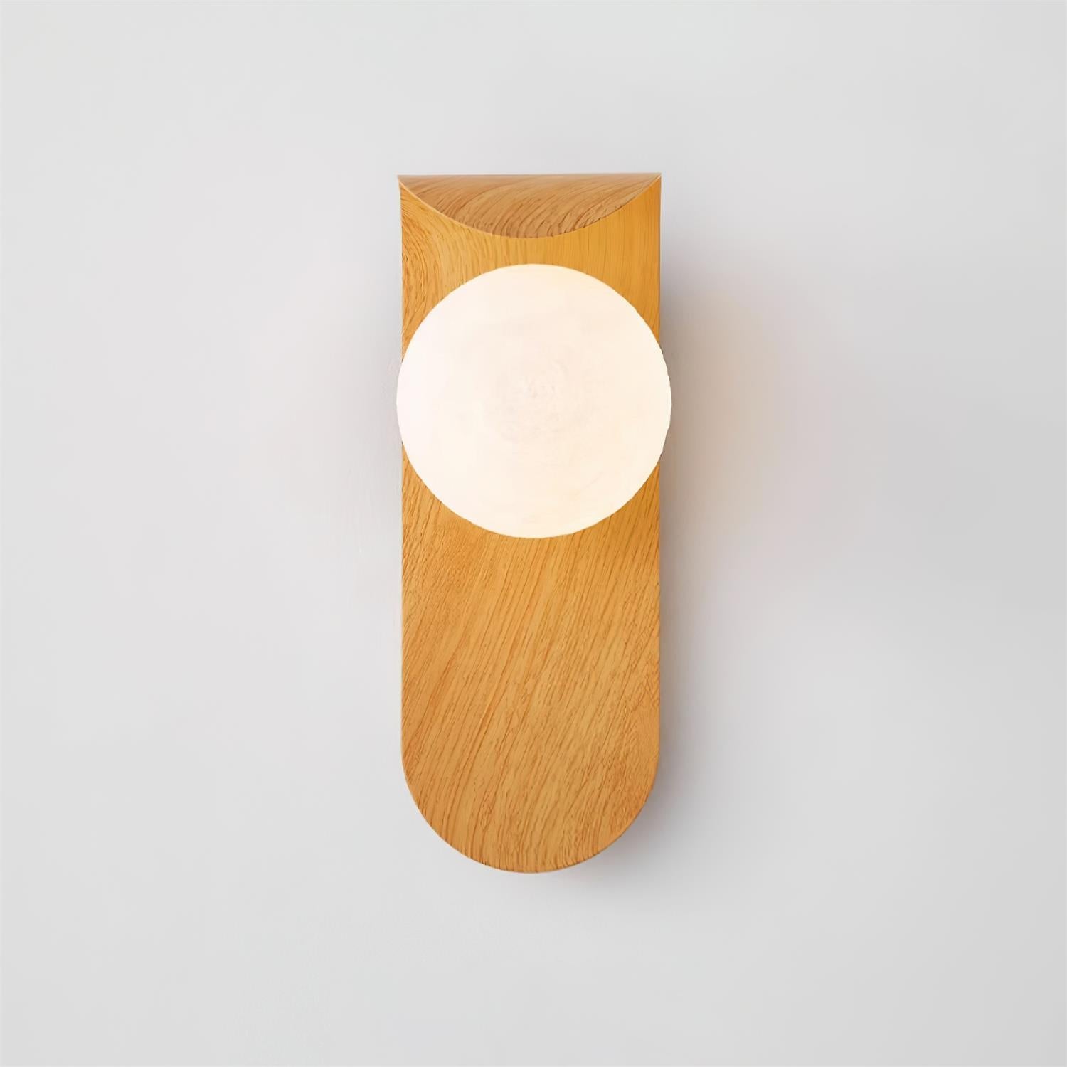 Wooden wall sconce with a round light bulb on a gray background
