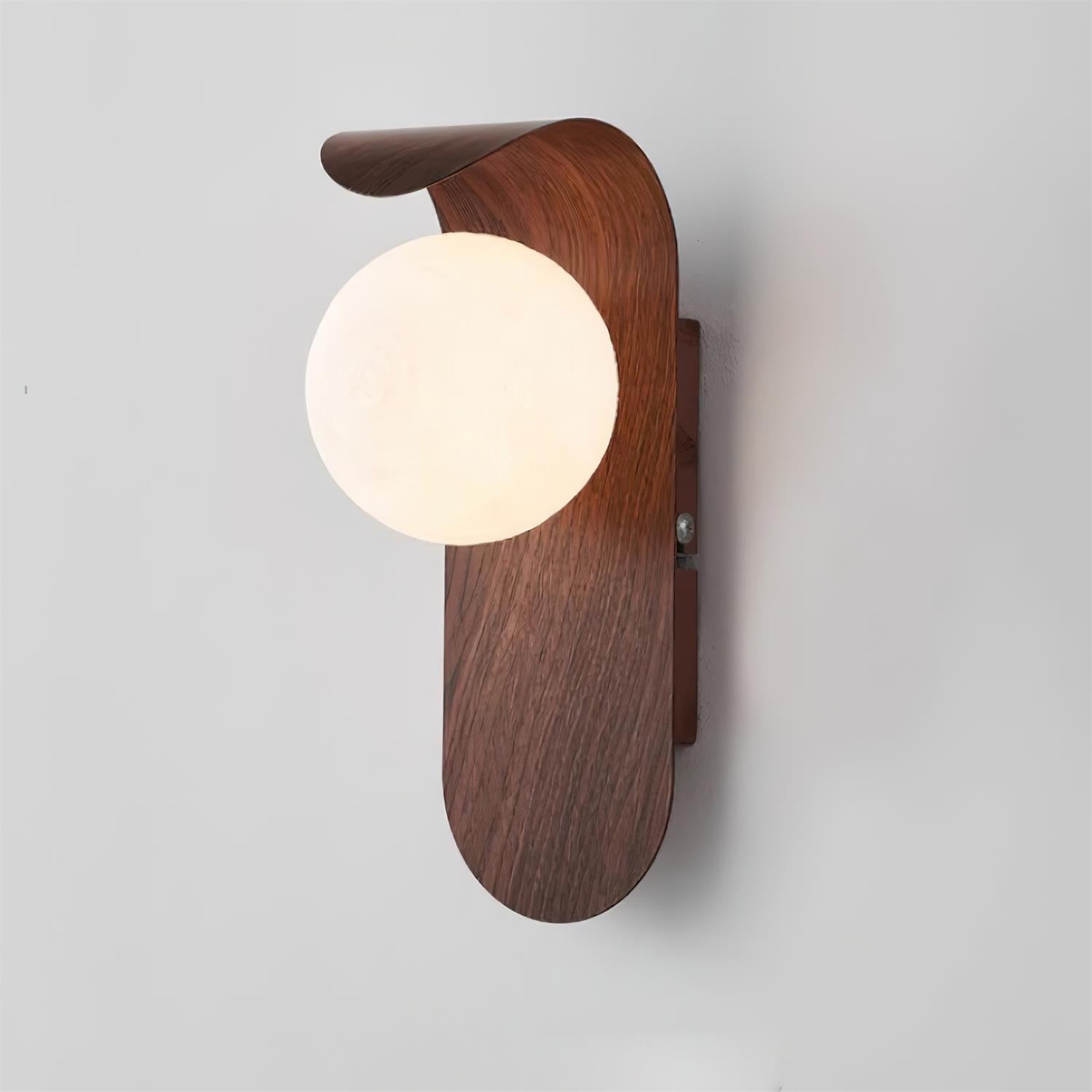 Wooden wall sconce with a round light bulb on a gray background
