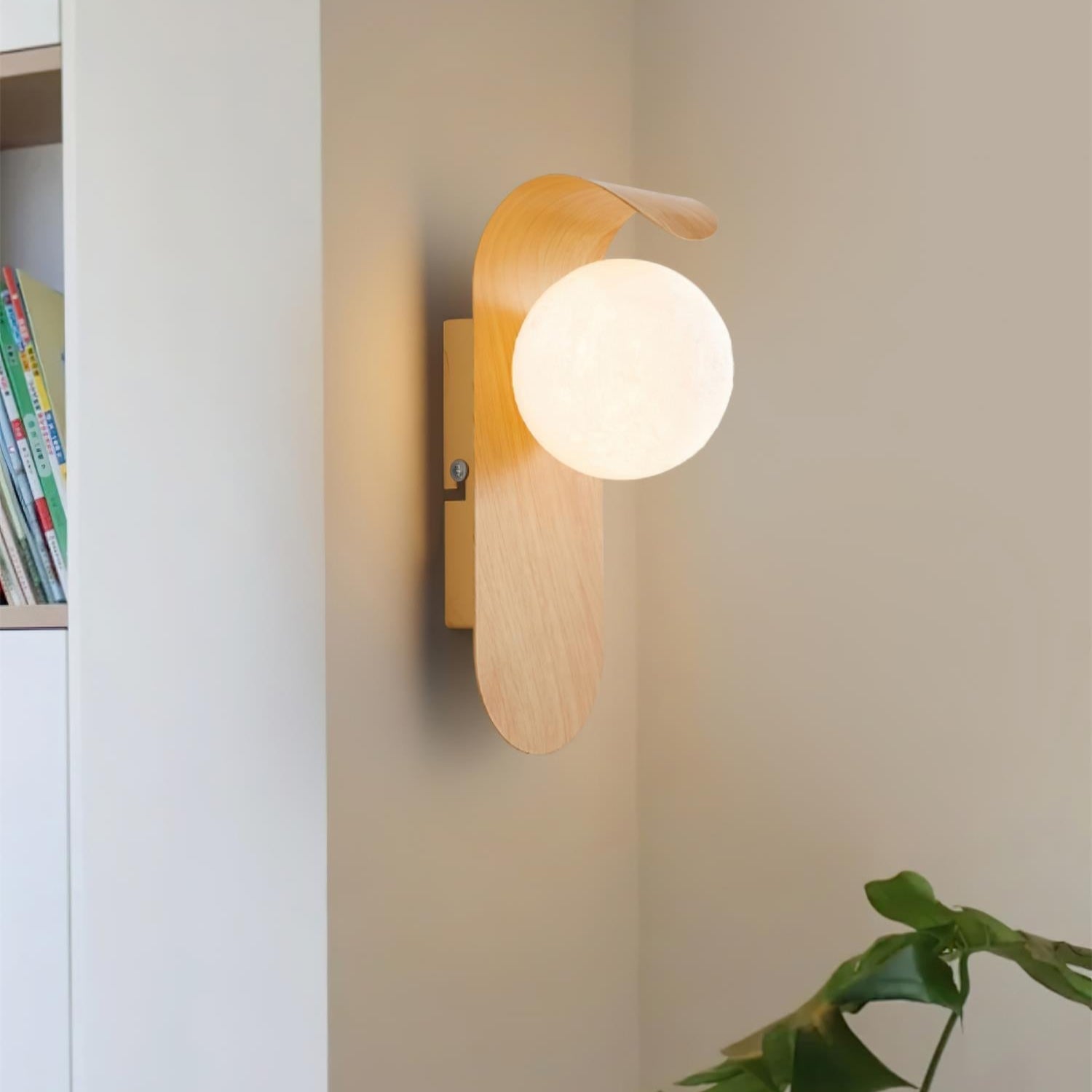 Modern wall lamp with wooden fixture on a neutral wall.
