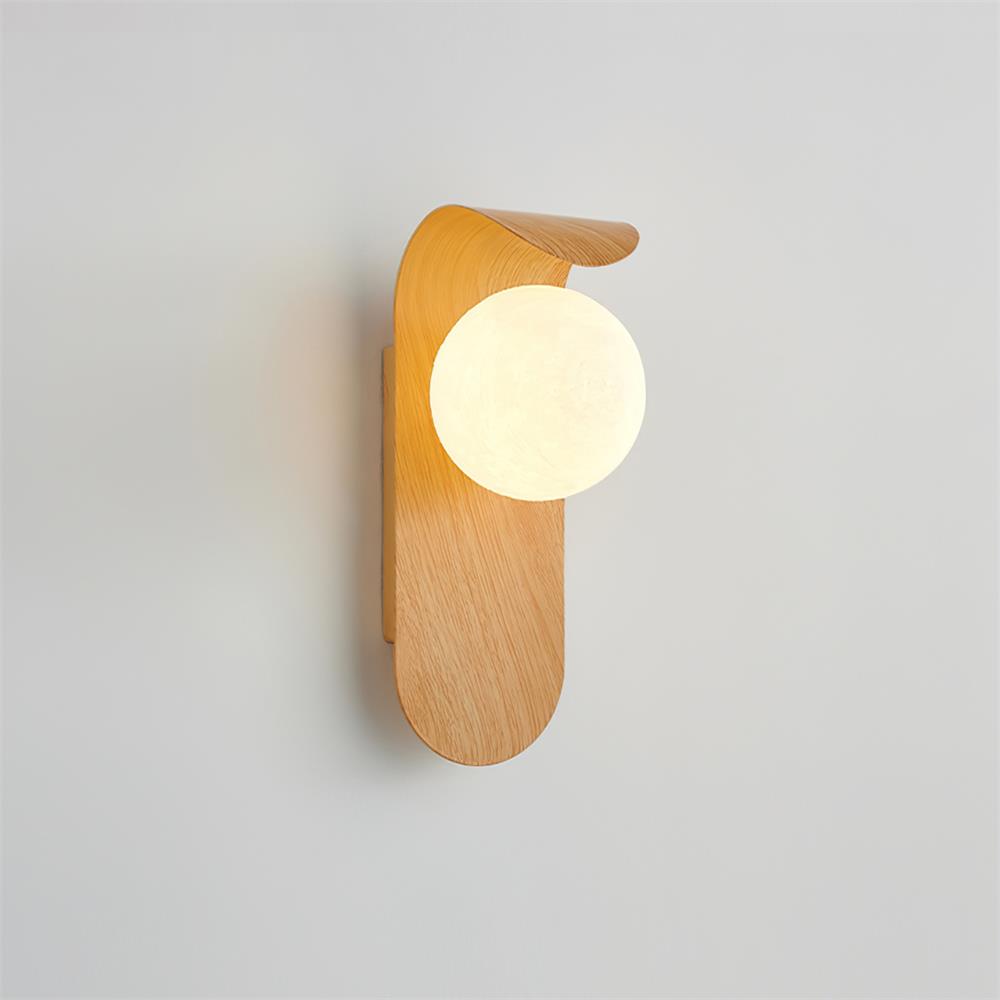 Wooden wall sconce with a round light bulb on a plain background
