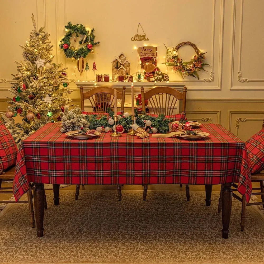 Dining room with a Christmas tree, table, and decorations.