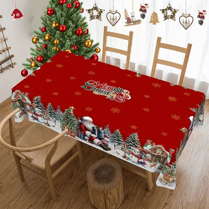 Christmas-themed tablecloth with Santa Claus design on a wooden table.
