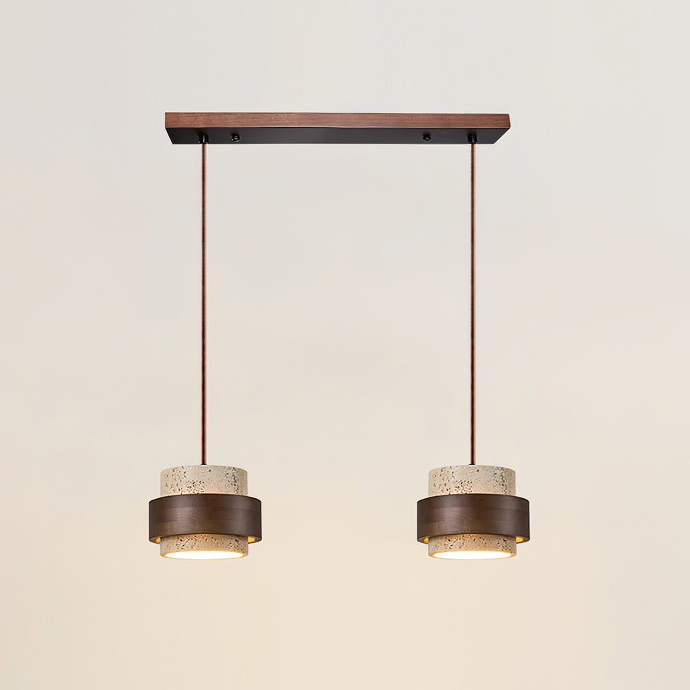 Modern pendant light fixture with concrete-like shades on a neutral background
